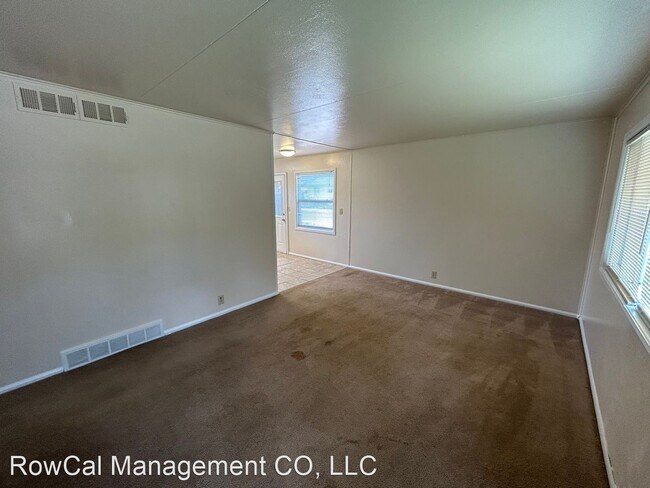 Building Photo - 3 br, 1 bath House - 1201 E. Cheyenne Road