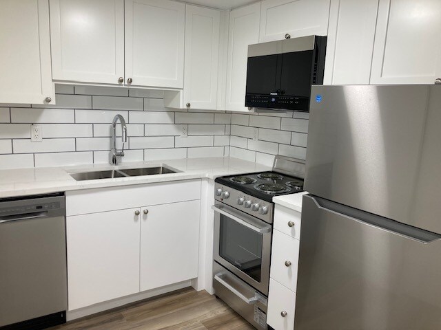 Photo du bâtiment - Bright 1 Bedroom with Outdoor Space