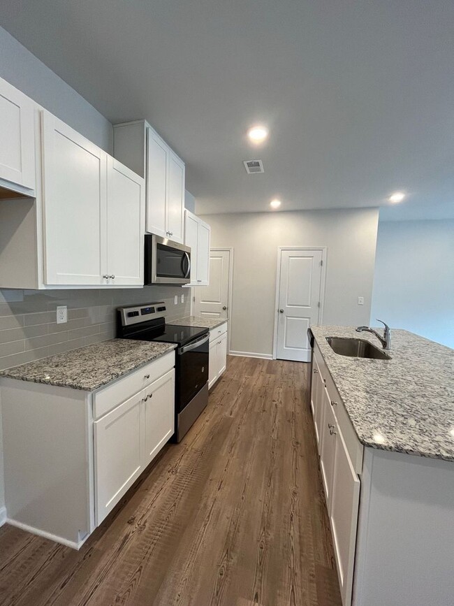 Building Photo - Beautiful New Construction Townhome in Daw...