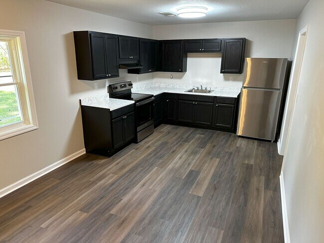 Photo - 3 Bedroom Home with Wooded Lot