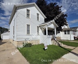 Building Photo - 612 W 8th Ave