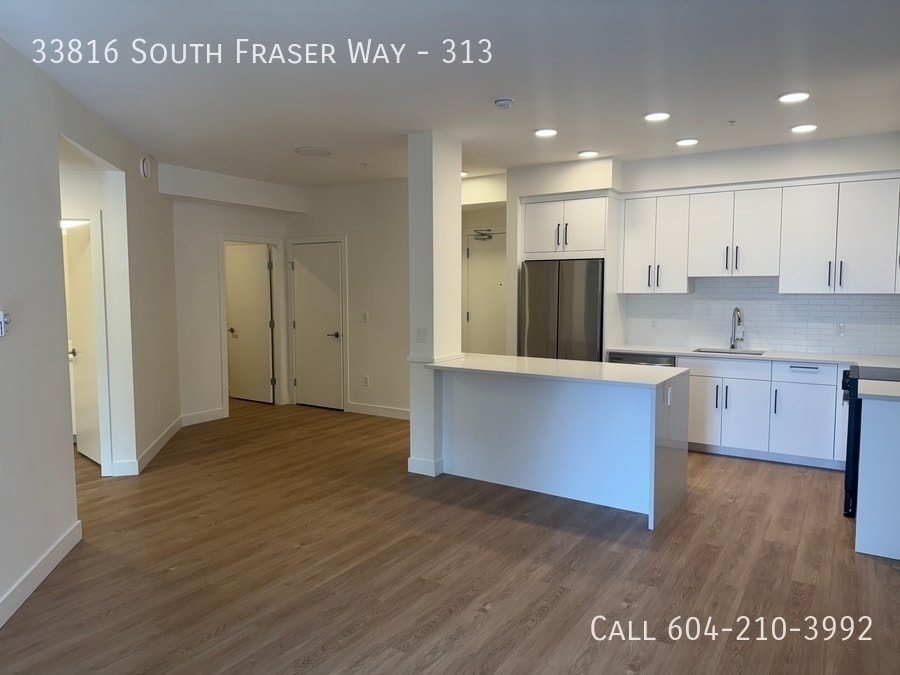 Primary Photo - Brand New 2 Bed + Den Condo with Large Patio