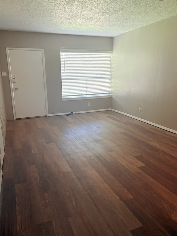 LIVING ROOM VIEW FROM CLOSET/HALLWAY - Vista Village Apartments
