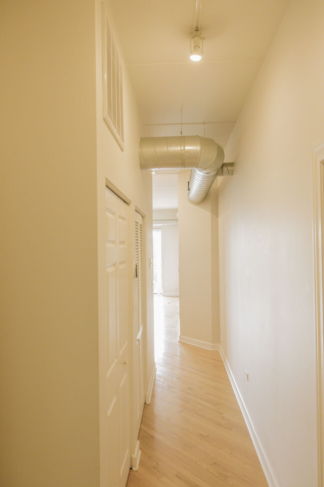 Entrance hallway, coats closet. - 3125 W Fullerton Ave