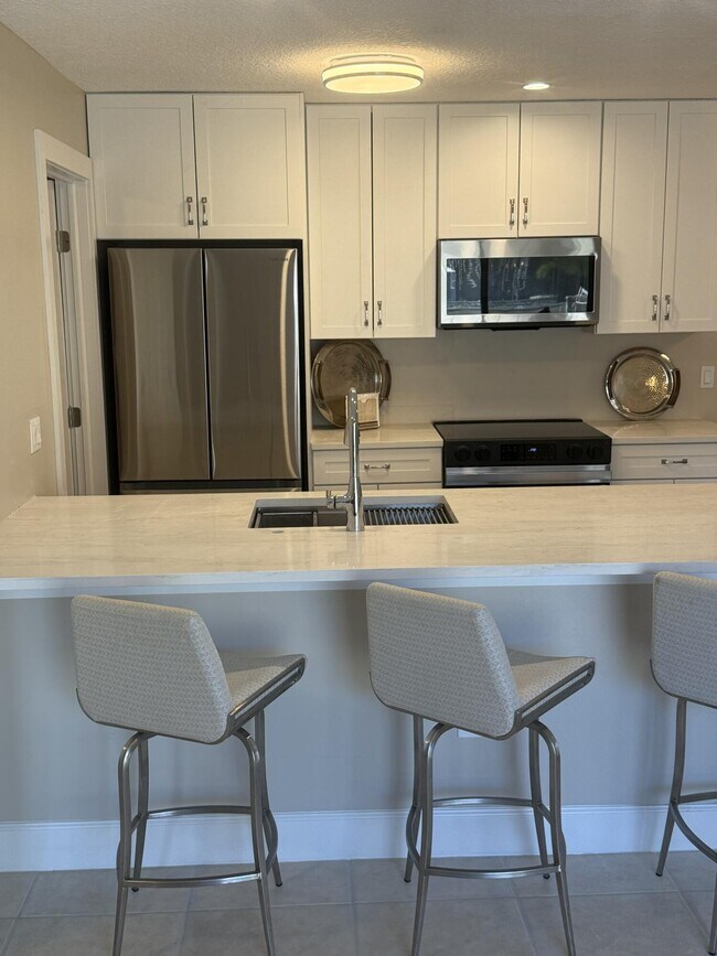 Foto del edificio - 3957 NW Cinnamon Tree Cir