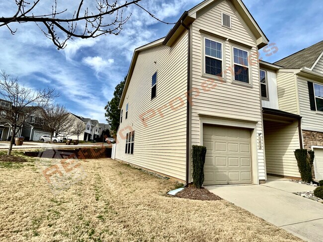 Building Photo - Beautiful 3 Bedroom 1 Car-Garage End unit ...