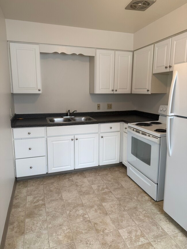 Kitchen - MadGrey Apartments