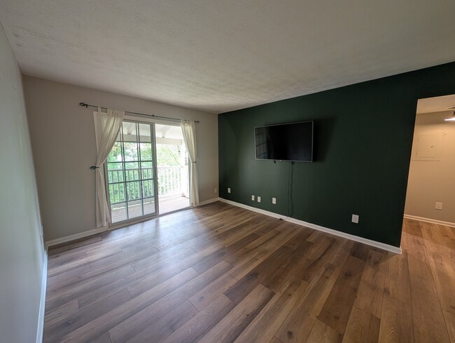 Cozy living room - empty view (TV not included) - 3140 7 Pines Ct NW