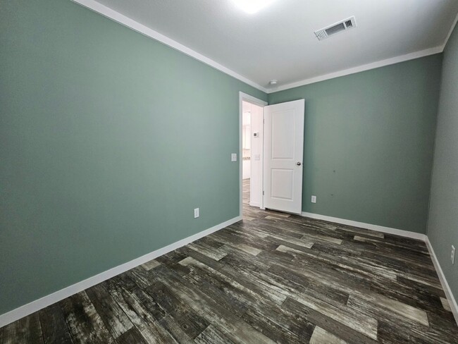 Foto del edificio - 6681 Hidden Oaks Dr