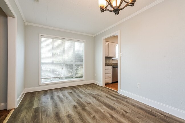 Building Photo - 4 BR/2BA | Updated Single Family Home | Gorgeous hardwoods | Storage attic!