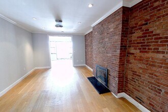 Building Photo - 102 E 7th St