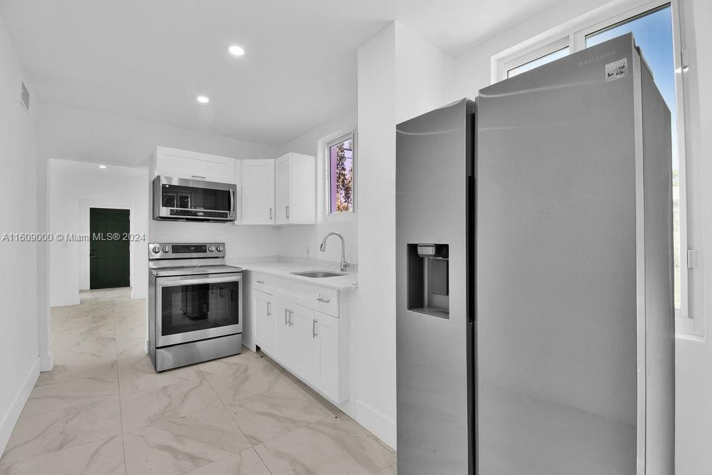 Foto principal - 3025 NW 8th Ave
