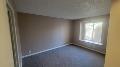 Primary Bedroom - Sunset Springs Apartments