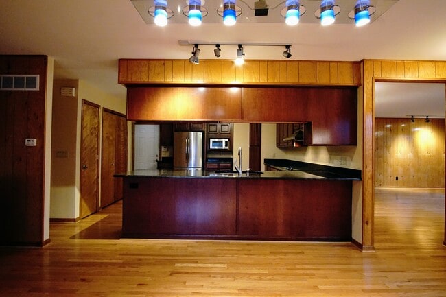 Dining room looking into kitchen - 2731 Acorn Rd