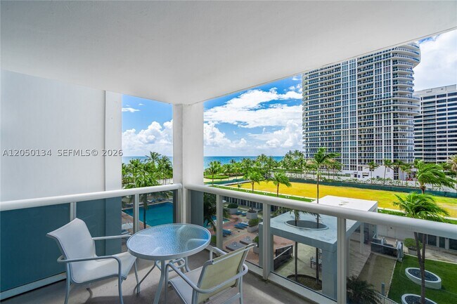 Building Photo - 10275 Collins Ave