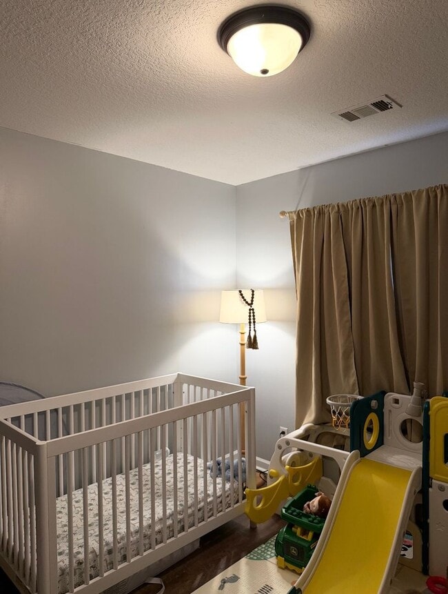 Building Photo - 9028 Whispering Pines Blvd