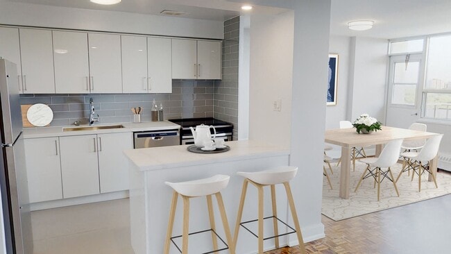 Open concept white kitchen in a 2 Bedroom unit at 360 Torrance. - 360 Torrance