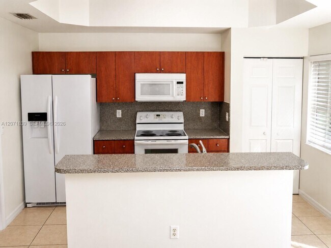 Building Photo - 4974 White Mangrove Way E