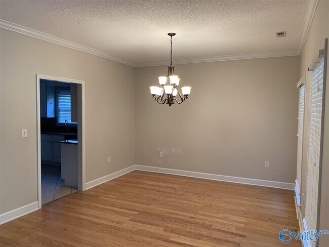 Building Photo - 129 Cannes Dr SE