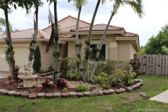 Building Photo - 4541 Little Palm Ln