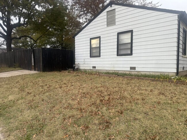 Building Photo - Step into this beautifully updated 1950's gem, where charm meets modern convenience