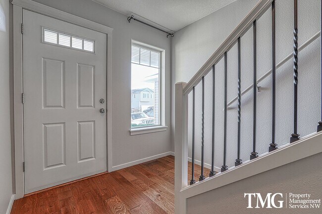 Building Photo - 2 Story Townhome with Vaulted Ceilings and...