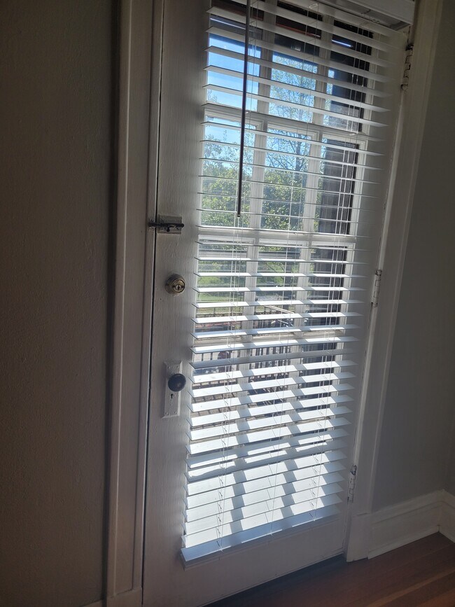 From the living room, access the balcony. - 2055 Alfred Ave