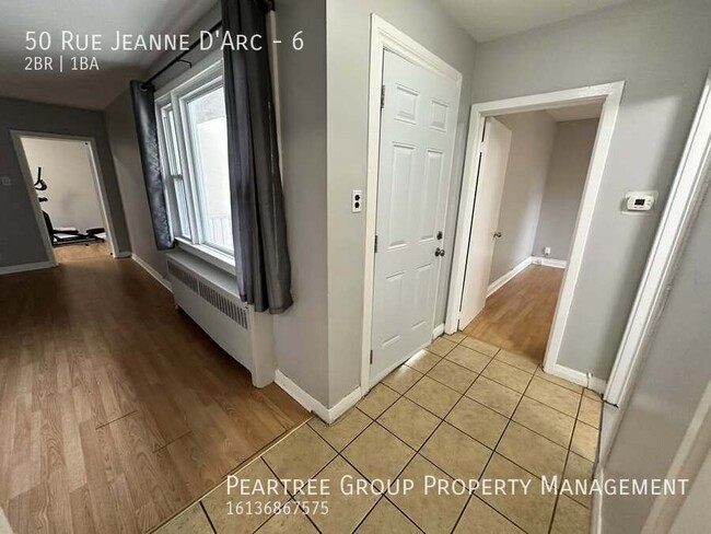 Photo du bâtiment - Joyful Jeanne-D'Arc-2 bed apartment for rent