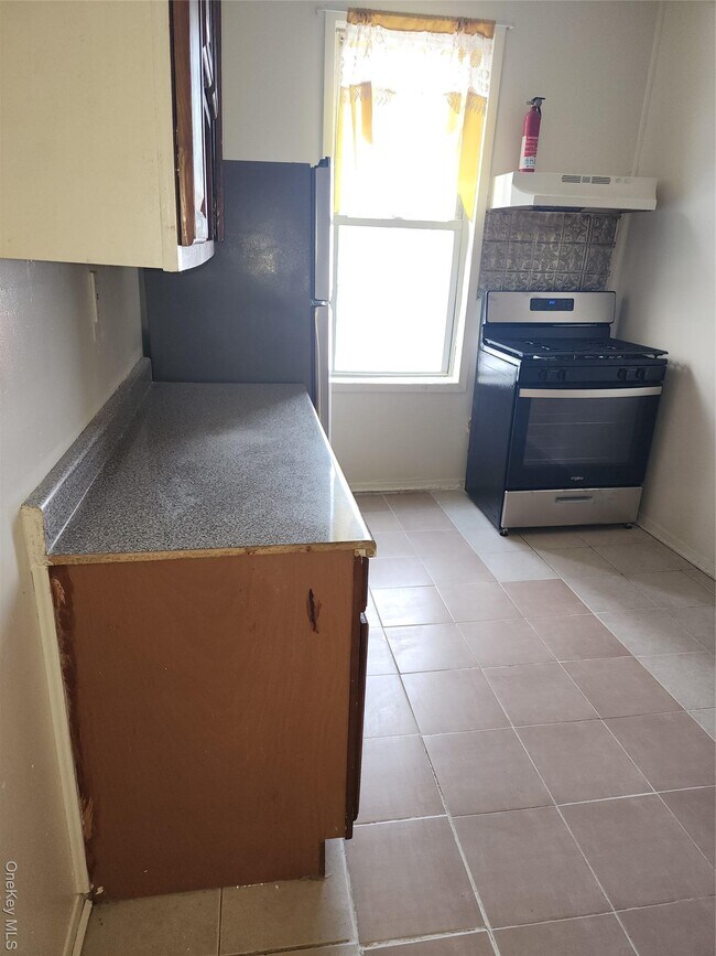 Foto del edificio - 205-11 Hollis Ave