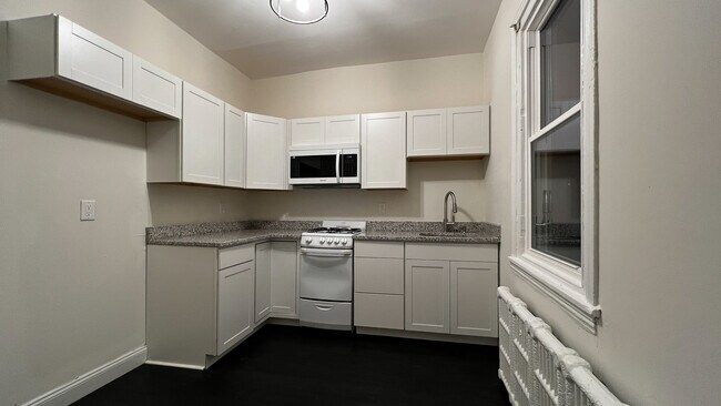 BRAND NEW kitchen! - 7827 Montgomery Ave