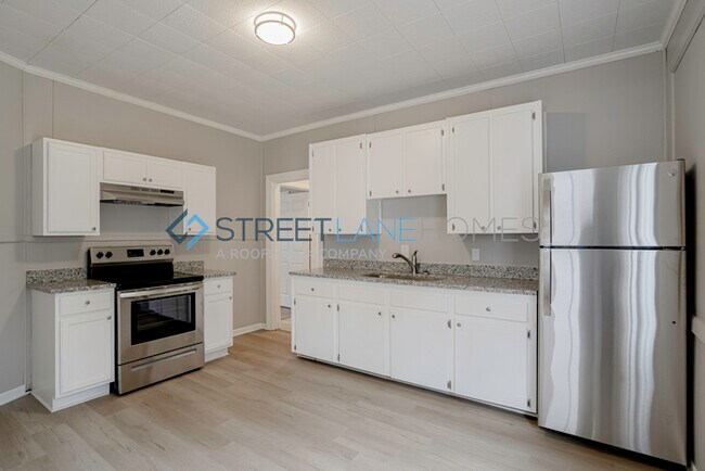 Building Photo - NOW OFFERING HALF OFF THE FIRST FULL MONTH...