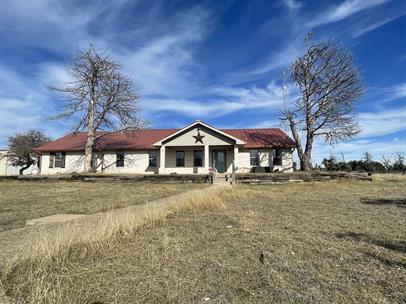 Building Photo - "Charming 3-Bed Oasis on US Highway 87: Sp...