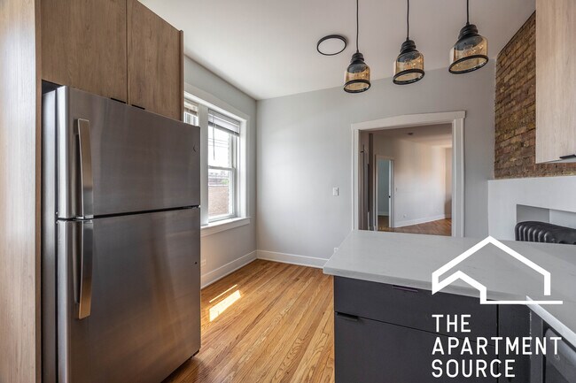 Foto del edificio - 4011 N Lowell Ave