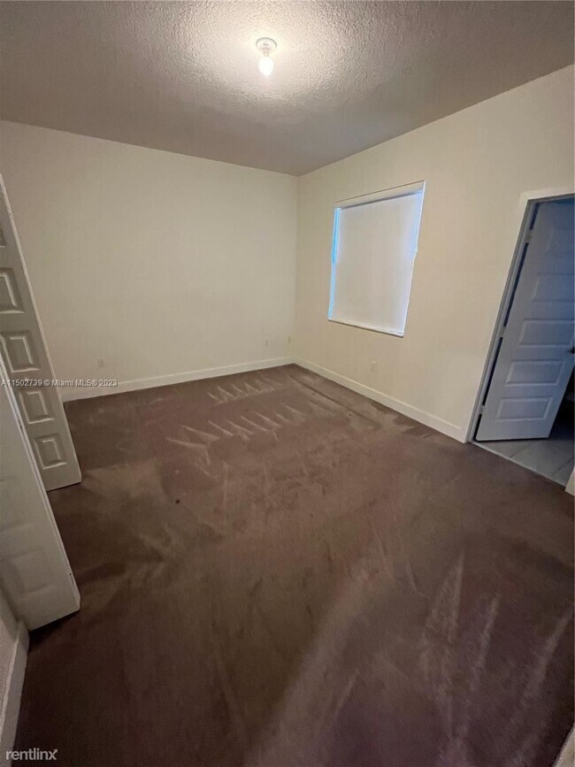 Building Photo - 3 br, 2.5 bath House - 10455 NW 82nd St Un...