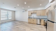 Located at 580 Media Place in Sacramento, CA, this 2-bedroom, 2-bathroom unit offers a thoughtfully designed single-floor layout with a clean, modern aesthetic. The open-concept kitchen and living area serves as the heart of the home, featuring light wood-tone cabinetry, granite countertops, stainless steel appliances including a refrigerator, range, microwave, and dishwasher, and recessed lighting. Light wood vinyl plank flooring runs throughout the main living areas, adding warmth and continuity to the space.

Both bedrooms are carpeted for comfort and receive natural light through large windows fitted with horizontal blinds. The primary bedroom includes a wall-mounted mini-split HVAC unit, providing individual climate control. A dedicated closet adds practical storage. The bathrooms are finished with clean white tilework, wood-look flooring, light wood vanities with granite countertops, and grab bars for accessibility.

The neutral color palette of warm beige tones throughout the unit creates a bright, cohesive ambiance. The efficient floor plan maximizes functionality across the living spaces, making this a well-appointed unit suited for comfortable everyday living in the heart of Sacramento.