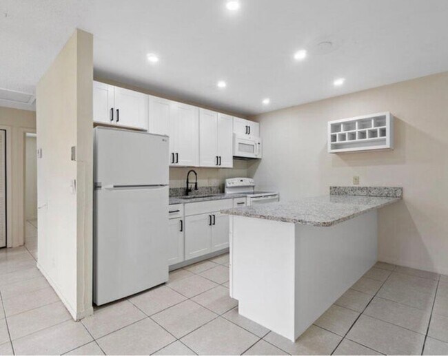 Foto del edificio - 5854 Kumquat Rd