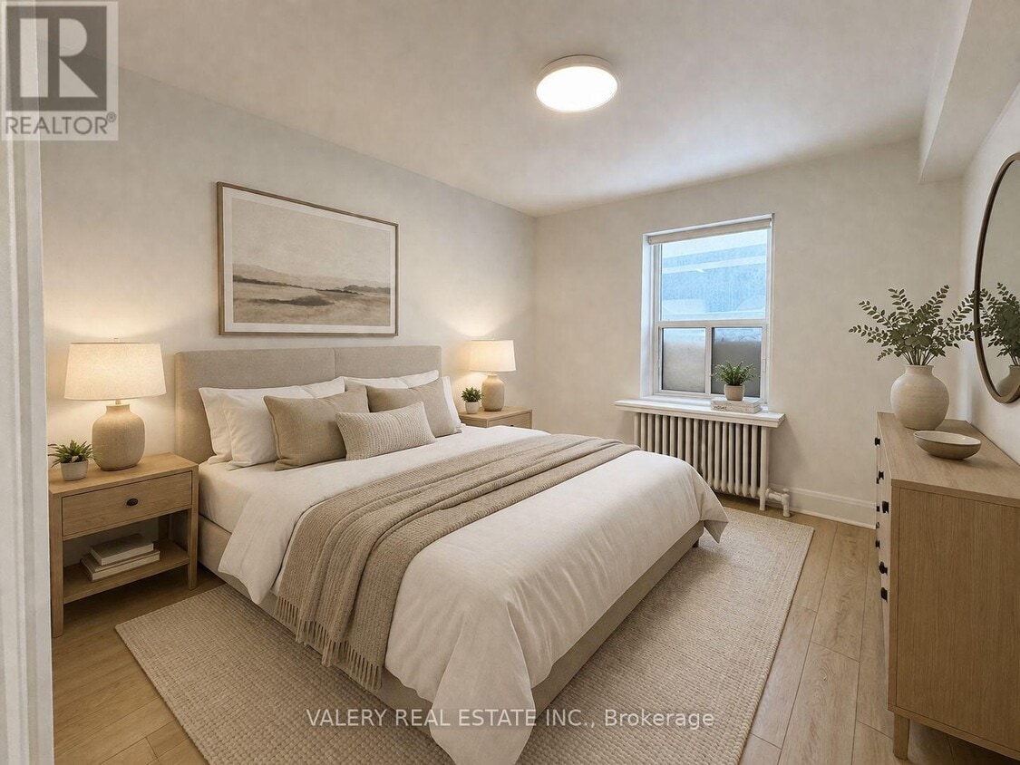 Building Photo - 2404 Queen St E