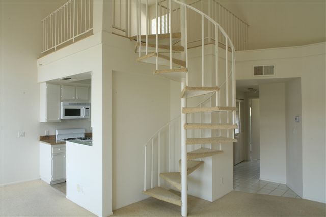 View of the spiral stairs to loft - 8500 Falmouth Ave