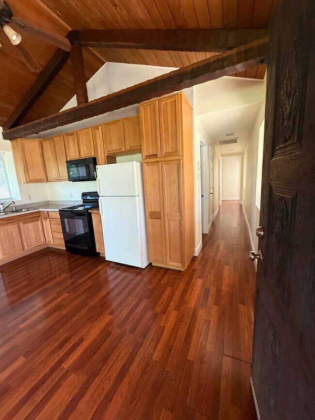 Building Photo - Charming Auburn Retreat with Vaulted Ceilings & Stone Fireplace