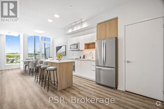 Building Photo - 4235-4235 Confederation Pkwy