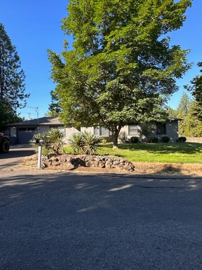 Building Photo - BEAUTIFUL LARGE HOME SURROUNDED BY TREE'S ...