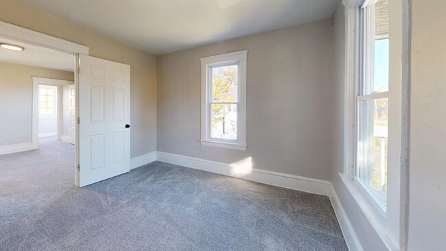 Building Photo - 7408 Dudley Ave