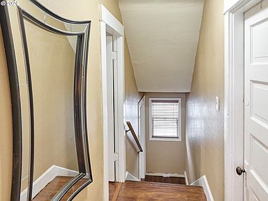 Building Photo - Beautiful three-level condominium in a qui...