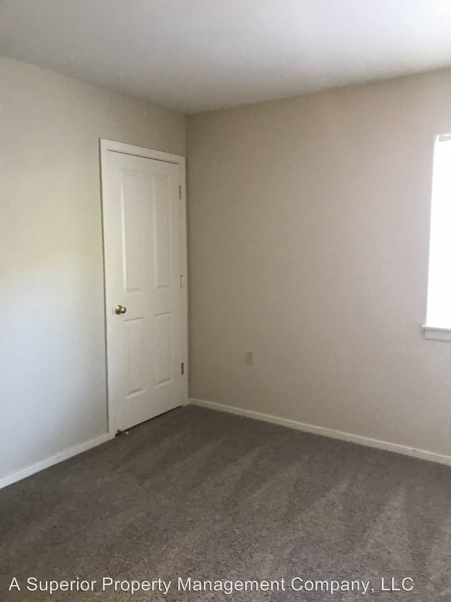Building Photo - 1731 NE Lotus Dr
