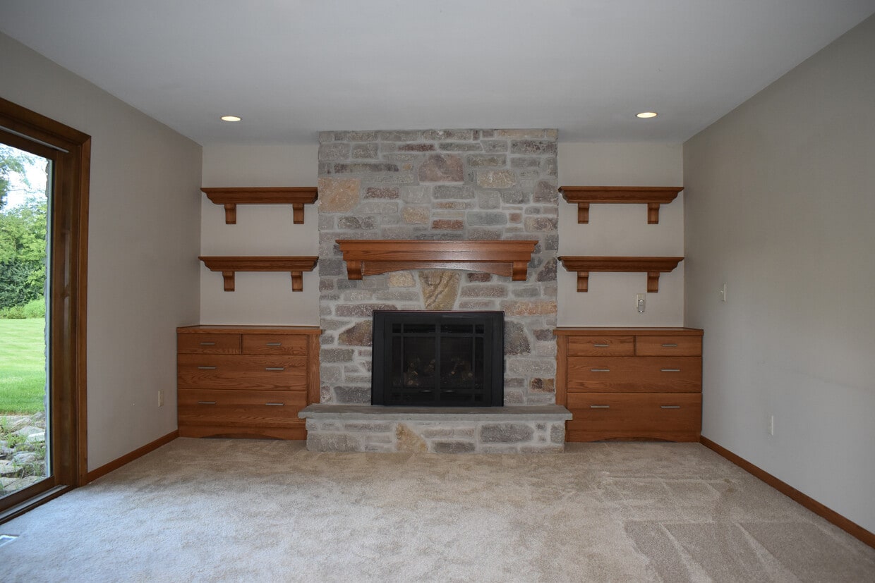 Family room with working electric fireplace - 9640 W Barnard Ave