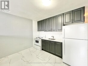 Building Photo - 2624 Eglinton Ave E