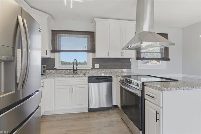 Foto del edificio - 3113 Woodlawn Dr