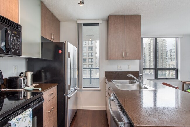 Photo du bâtiment - 1207-909 Mainland