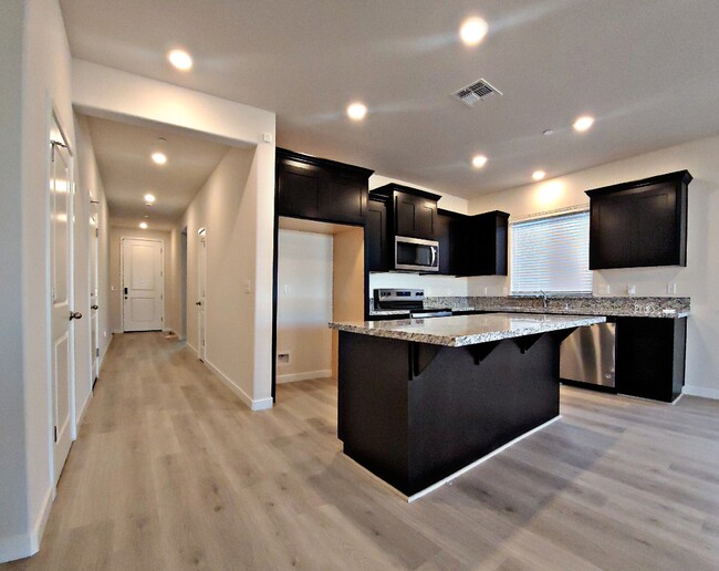 Kitchen and entry hallway - 8008 Pasadena Dr