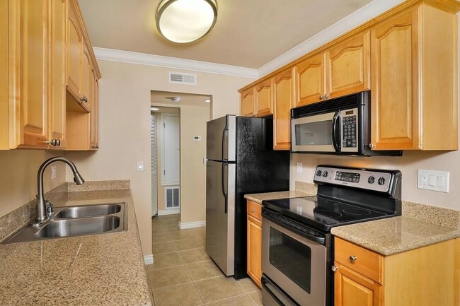 Building Photo - Legacy Condominium Apartments